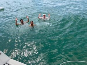 Picture taken from the boat down to the water where Gareth, Ollie and Anil are swimming.