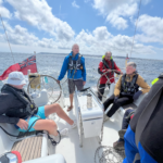 Leaving Guernsey Mark on Helm Andy B John and Chris in view