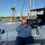 Having a gin and tonic on the back of the yacht